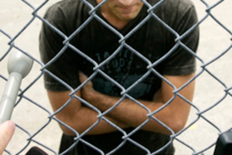 Larry Birkhead talks with reporters at airport in Louisville, Ky., yesterday.