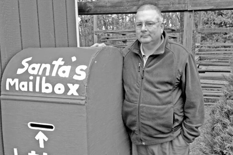 Jay Bustard, 57, of Gilbertsville, Montgomery County, owns Bustard's Christmas Trees with brother Glenn and mother Virginia.