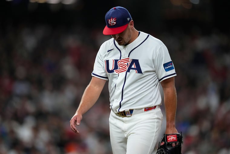 Phillies and U.S. pitcher Brad Keller walks to the dugout in the middle of the sixth inning of a loss to Italy on Tuesday in Houston.