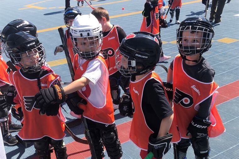 Players from the Gloucester Township Hockey Alliance during the last night of their six-week "Learn to Play" program.