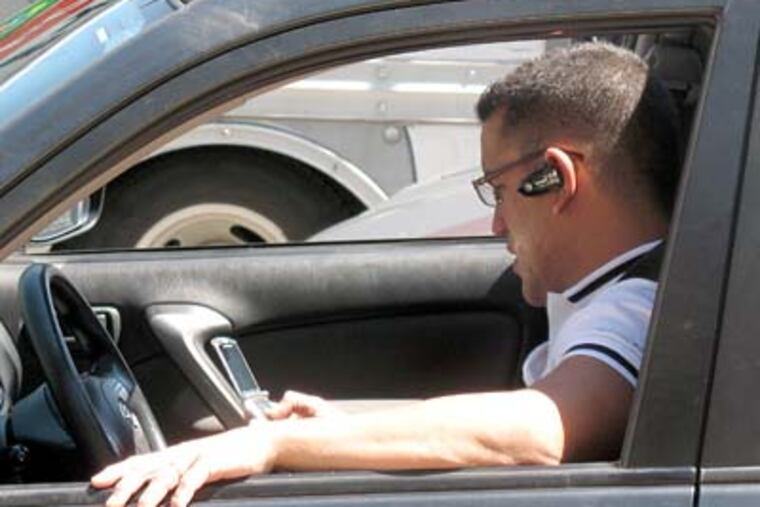 City Council passed a ban on hand-held cell phones for Philadelphia drivers on Thursday. (Zoe Tillman / Staff Photographer)