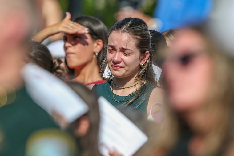 A student mourns during a vigil on the Florida State campus in Tallahassee on April 18, 2025, after a school shooting the day before.