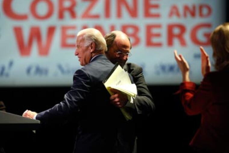 New Jersey Gov. Jon S. Corzine, center, and Vice President Joe Biden embrace before Biden addressed the New Jersey AFL-CIO. (AP Photo/Matt Rourke)