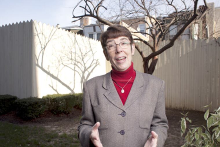 Sister Mary Scullion in the garden of Rowan House, which provides supportive housing to the formerly homeless. (Ed Hille / Staff Photographer)
