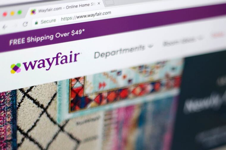 The Wayfair website on a computer in New York. Wayfair, on Friday, Aug. 19, 2022, is cutting about 870 employees, or 5% of its global workforce, as part of a plan previously announced by the home goods company to manage operating costs and realign its investment priorities.