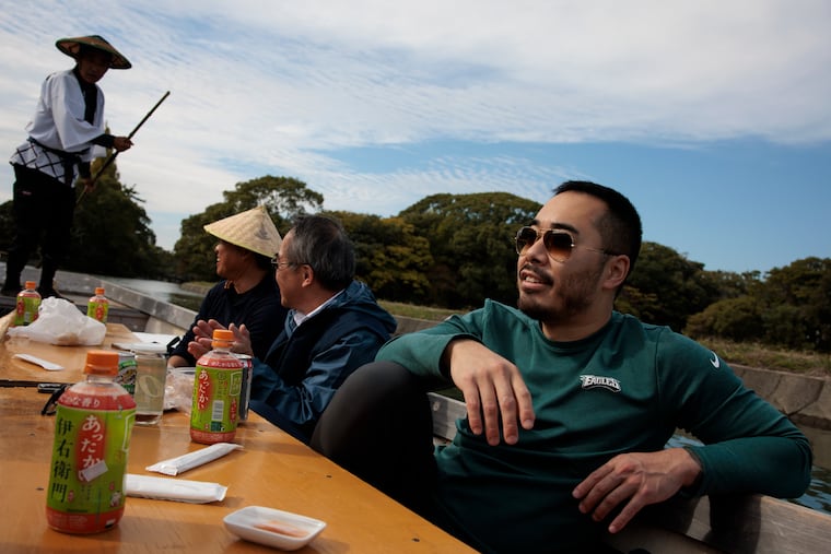Jesse Ito relaxes during a boat ride though the canals of Yanagawa on Wednesday, Nov. 5, 2025 in Yanagawa City, Japan. The boat is called a donko-bune.
