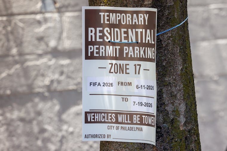 A sign for a temporary no-parking zone except for residents with a special permit during FIFA Fan Festival at Lemon Hill.