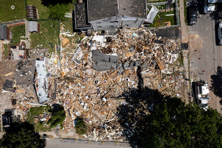 Debris covers the site of an explosion at the corners of Butler Avenue and Hale Street in Pottstown.
