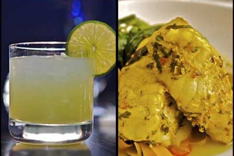 Craig LaBan suggests the Green Demon with absinthe (left), and says the Singapore-style monkfish over shaved sweet potato "noodles" is excellent.