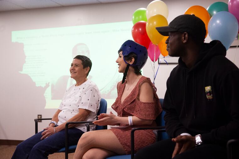 Ligia Ramirez-Maldonado, left, Tala Ayyad, and Nasair Boston-Epps at Hahnemann University Hospital in Philadelphia on Wednesday, May 15, 2019, for a trauma survivors event.
