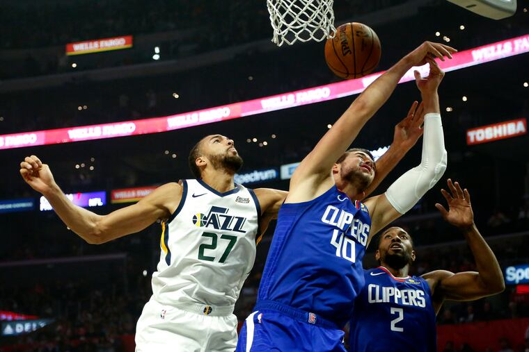 Utah Jazz's Rudy Gobert (27) and Joel Embiid should provide an interesting matchup Wednesday night.