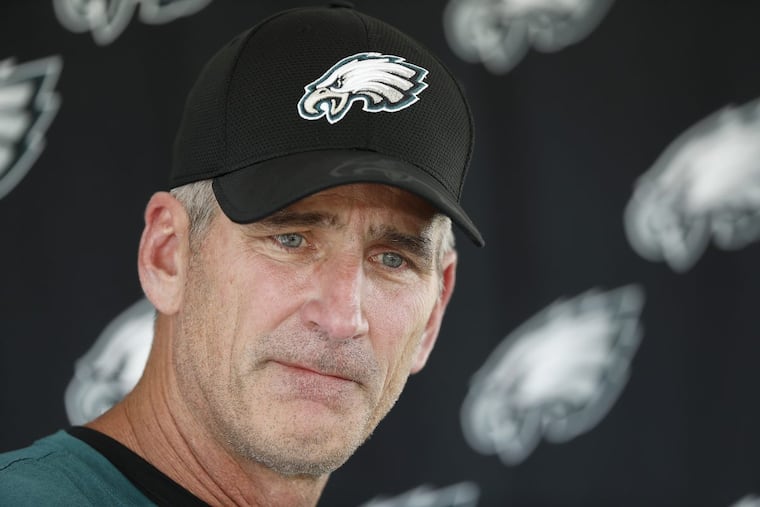 Eagles’ offensive coordinator Frank Reich listens to a question during his news conference on Thursday.