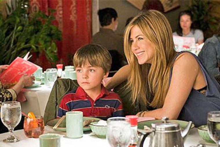 Jennifer Aniston, right and Thomas Robinson are shown in a scene from "The Switch." (AP Photo/Miramax Films-Disney, Macall Polay)