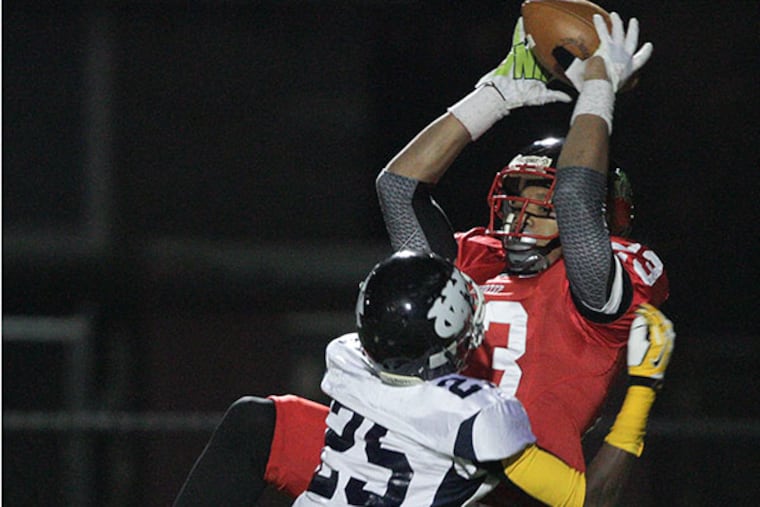 D.J. Moore catching a long pass for Imhotep against West Catholic.