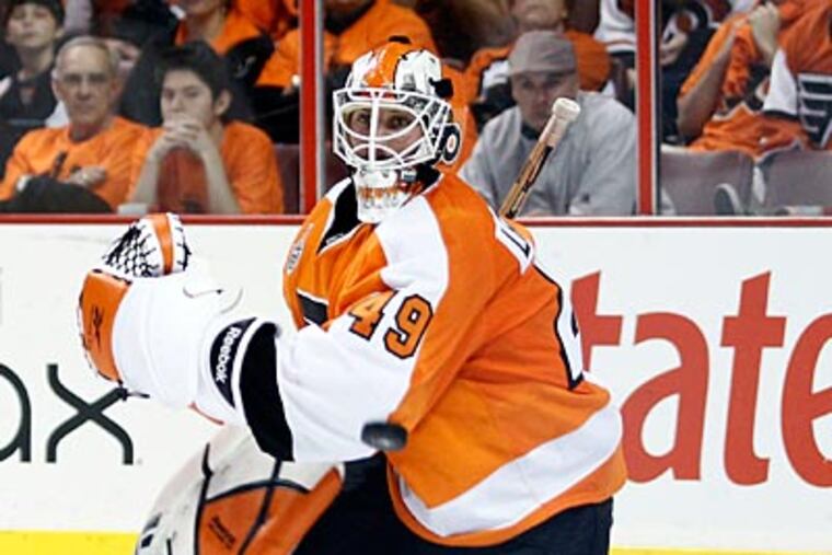 Michael Leighton has the best goals-against average and save percentage among playoff goalies. (Yong Kim / Staff Photographer)