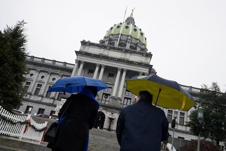 Visitors enter the Pennsylvania Capitol Building in Harrisburg on Jan. 3 for the swearing-in ceremony for members of the state House of Representatives.