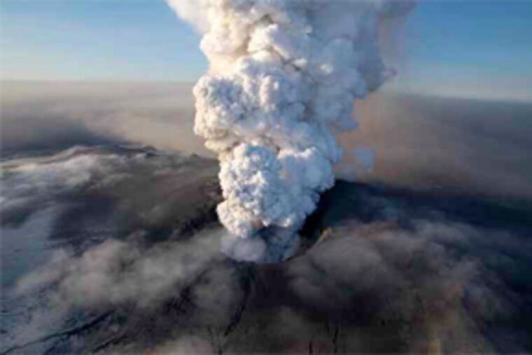 A crater spews ash and plumes of grit at the summit of the E15 volcano in Iceland in this aerial image taken Saturday. (Arnar Thorisson / Helicopter.is, AP)