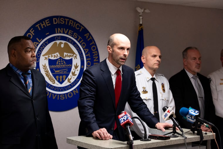 Delaware County District Attorney Tanner Rouse speaks to reporters Thursday about the arrest of Jonathan Christian Gerlach of Ephrata, who is charged with burglary, abuse of corpse and desecration, and theft or sale of venerated objects for allegedly stealing skulls and bones from graves.