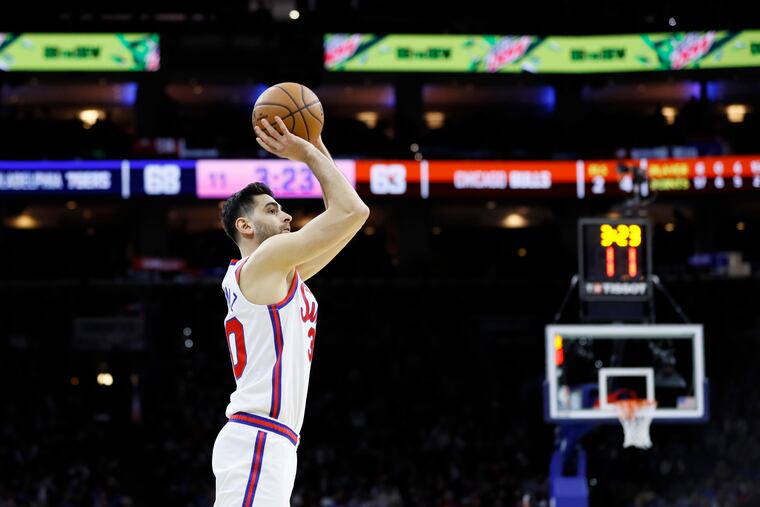 Furkan Korkmaz knocks down a three-point shot in the third quarter of Friday night's game against the Chicago Bulls.