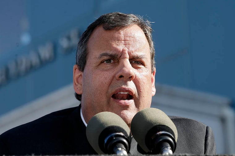 Gov. Christie, in New Brunswick to sign two drug-abuse bills, addresses a news conference. He said reports of a plea in the George Washington Bridge lane closures would not involve him, and defended the sending of state troopers to Baltimore. (MEL EVANS / Associated Press)