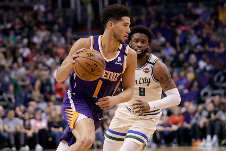 Suns guard Devin Booker caught some heat for not picking his own team in the NBA's 2K tournament.