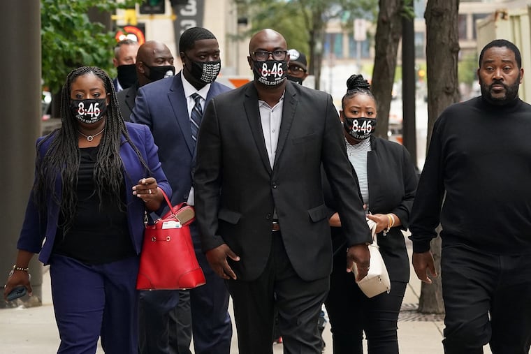 Family members of George Floyd, including his brother Philonise Floyd, are shown arriving at the Hennepin County Family Justice Center for a hearing on Sept. 11, 2020.