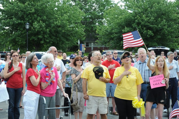 Operation Yellow Ribbon's welcome home ceremony for Air Force Lt. Col. Sally Stenton when she returned home to Cherry Hill from Afghanistan after eight airmen and one civilian she worked with were massacred in 2011. Stenton is on the left, next to her elderly mother, Dolores, who served in WWII in the Women's Army Corp.