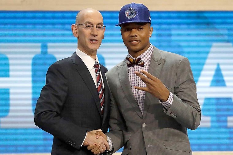 Markelle Fultz meets with NBA Commissioner Adam Silver after Fultz was selected first overall by the 76ers.