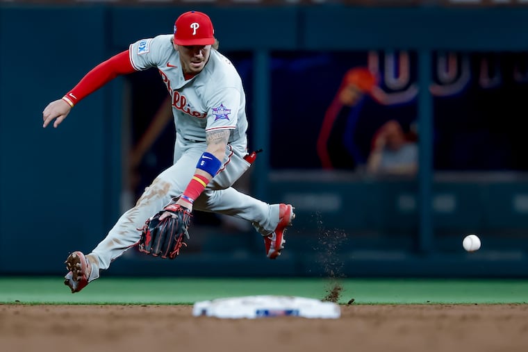 Phillies second baseman Bryson Stott (5) fields a ground ball during last week's series against the Atlanta Braves.