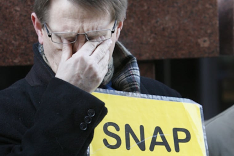 A member of SNAP, Survivors Network of those Abused by Priests, cries during a
February protest in front of the Philadelphia archdiocese office. (Alejandro A. Alvarez / Staff Photographer)