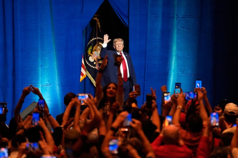 Donald Trump waves after speaking at an event at the Red Rock Casino Resort and Spa in Las Vegas on Wednesday. Nothing signals economic prosperity like the backdrop of folks hoping to dig out of debt with the next roll of the dice, writes the Editorial Board.