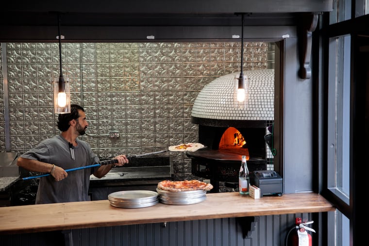 Roberto Carollo makes the Carbonara pizza at Spuntino on Monday, Aug. 31, 2026 in Doylestown, Pa.