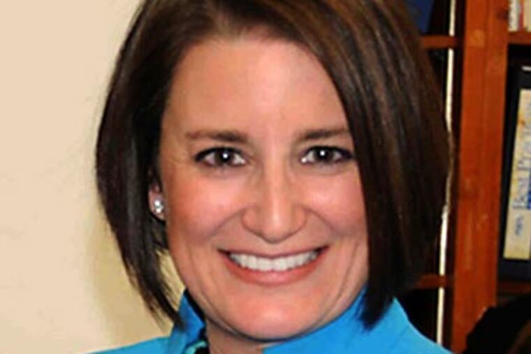 "Risa (Vetri Ferman, above) wouldn't be district attorney if it weren't for Bruce," said Commissioner Joseph M. Hoeffel III, a Democrat. "This is the textbook definition of conflicts of interest and being too close politically."