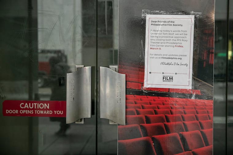 A sign of closure hangs outside of the Philadelphia Film Society in Center City Philadelphia on Tuesday, March 17, 2020.