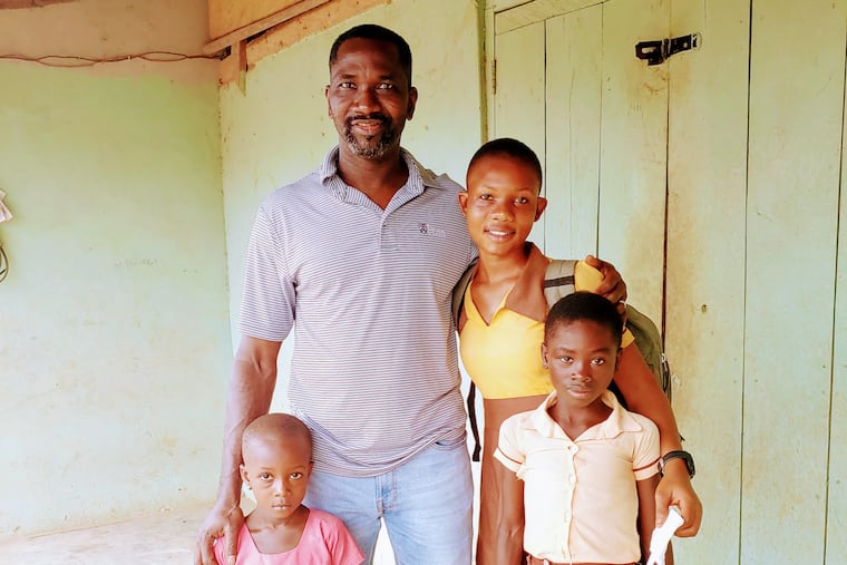 Robert Asante arrived in Philadelphia from Ghana in 1998, worked as a busboy and baker, and volunteered to service computers for Drexel before earning his degrees. He is now chief privacy officer for ChristianaCares, the four-state medical network, and has started a nonprofit, Our Foundations, to build a road upgrading the forest trails he walked to school as a boy and other improvements in his hometown in western Ghana. He is pictured there with schoolchildren, including his niece, on a visit in 2019. He holds a bachelor's in computer science and MBA degrees from Drexel, and a doctorate from Penn's education school, which on May 14, 2022, plans to award him the Kwami Nkumrah Distinguished Alumni Award. Nkumrah, who won degrees from Lincoln University and Penn, was a leader in the struggle to end the U.K.'s colonial rule, Ghana's first president, a leader in the pan-African movement of the 1960s, and a native of Asante's home region.
