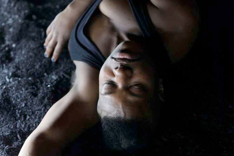 Jennifer Kidwell, with a gorgeous singing voice, portrays Antigone in the Wilma Theater's highly stylized interpretation of Sophocles' ancient production adapted by Theodoros Terzopoulos. (Matt Saunders)