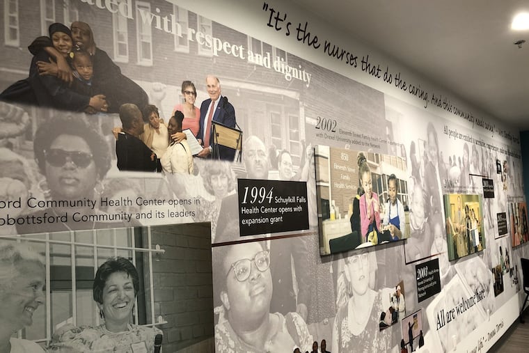 A mural in a conference room at Family Practice & Counseling Services Network's headquarters in Nicetown shows a timeline of the agency's history since its founding in 1992.