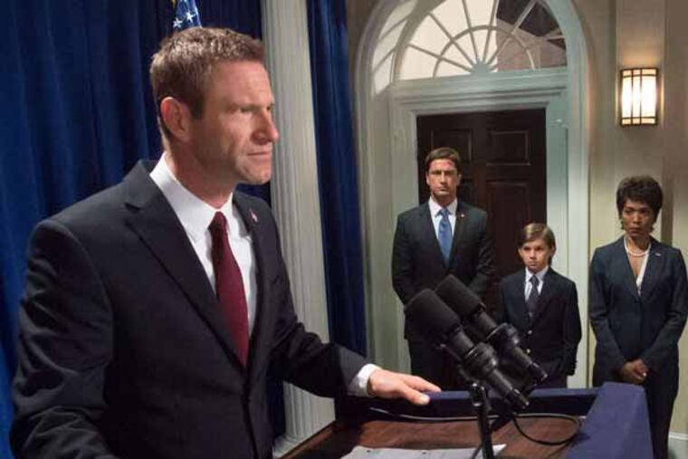 This film image released by FilmDistrict shows, from left, Aaron Eckhart, Gerard Butler, Finley Jacobsen, Angela Bassett and Robert Forster in a scene from "Olympus Has Fallen." (AP Photo/FilmDistrict, Phil Caruso)
