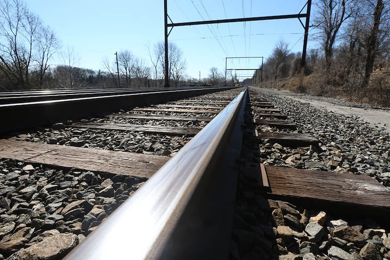 SEPTA train tracks between Hulmeville Rd., and Hulmeville Ave., in Langhorne, Pa., on Mar. 12, 2015. ( DAVID SWANSON / Staff Photographer )