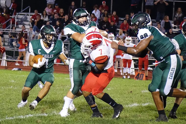West Deptford's Kenny Lim turning the corner against Delsea.