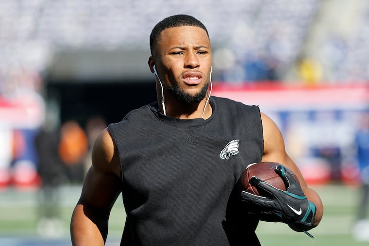 Eagles running back Saquon Barkley warms-up before the Eagles play the New York Giants at MetLife Stadium in East Rutherford, New Jersey on Sunday, October 20, 2024.