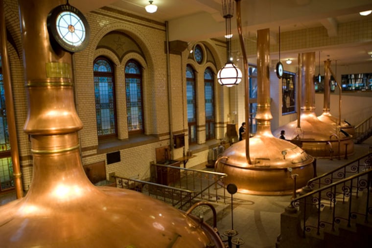 Large kettles for making beer at Amsterdam's Heineken Experience.