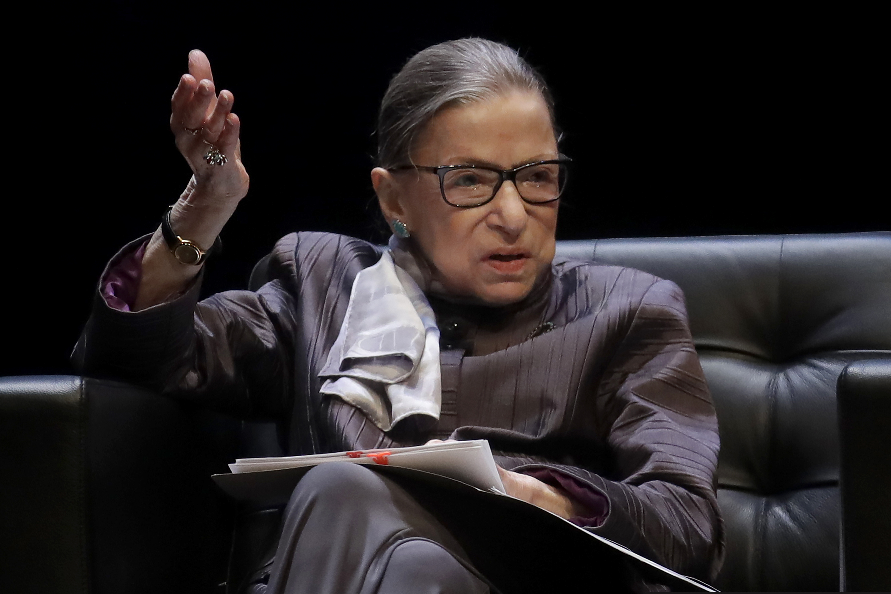 FILE - In this Oct. 21, 2019, file photo, U.S. Supreme Court Justice Ruth Bader Ginsburg gestures while speaking during the inaugural Herma Hill Kay Memorial Lecture at the University of California at Berkeley, in Berkeley, Calif. The Supreme Court says Ginsburg has been hospitalized after experiencing chills and fever. In a statement Saturday, Nov. 23, the court’s public information office says Ginsburg was admitted Friday night to Johns Hopkins Hospital in Baltimore.
