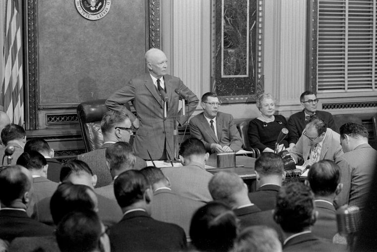 President Dwight Eisenhower at a 1957 news conference. A recent poll rated him the fifth-best president.