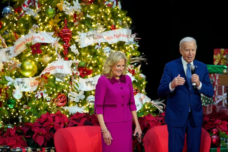 President Joe Biden speaks after first lady Jill Biden read "Twas the Night Before Christmas" to patients at Children's National Hospital on Friday.