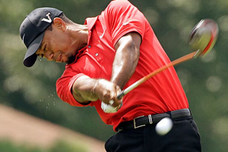 As ever, Tiger Woods will be at the center of attention at the PGA Championship. (Mark Duncan/AP file photo)