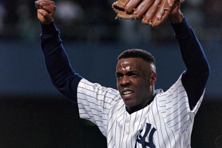 New York Yankees pitcher Dwight Gooden is carried off the field by his teammates after pitching a no-hitter against the Seattle Mariners on May 14, 1996. The Yankees won 2-0.