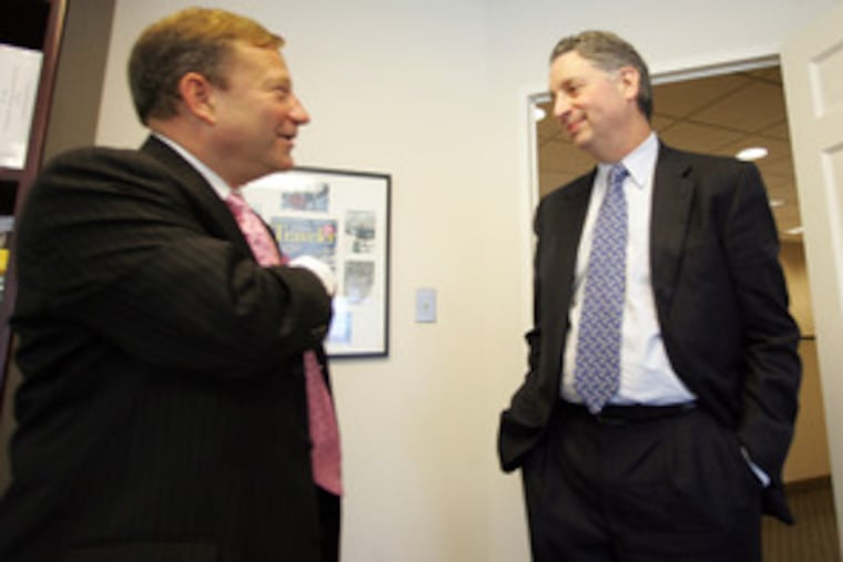 Mark Silow (right), chief executive at Fox Rothschild, with lawyer Abe Reich.