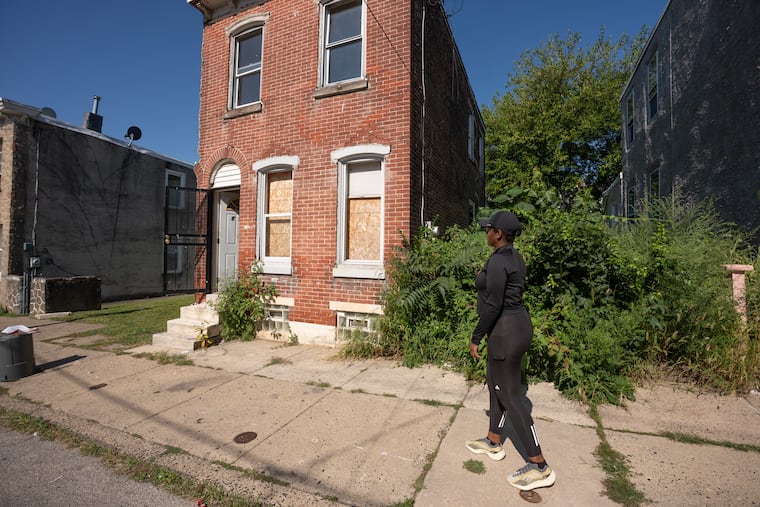 Crystal Hall returns to the house at 127 E. Pastorius St. where her mother Patricia Hall, was killed in September 2023.