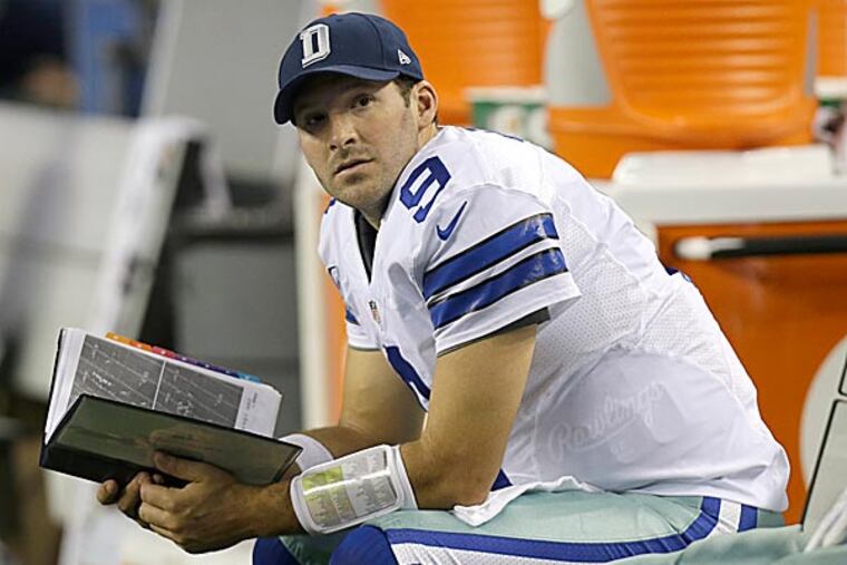 Cowboys quarterback Tony Romo. (Tim Sharp/AP)